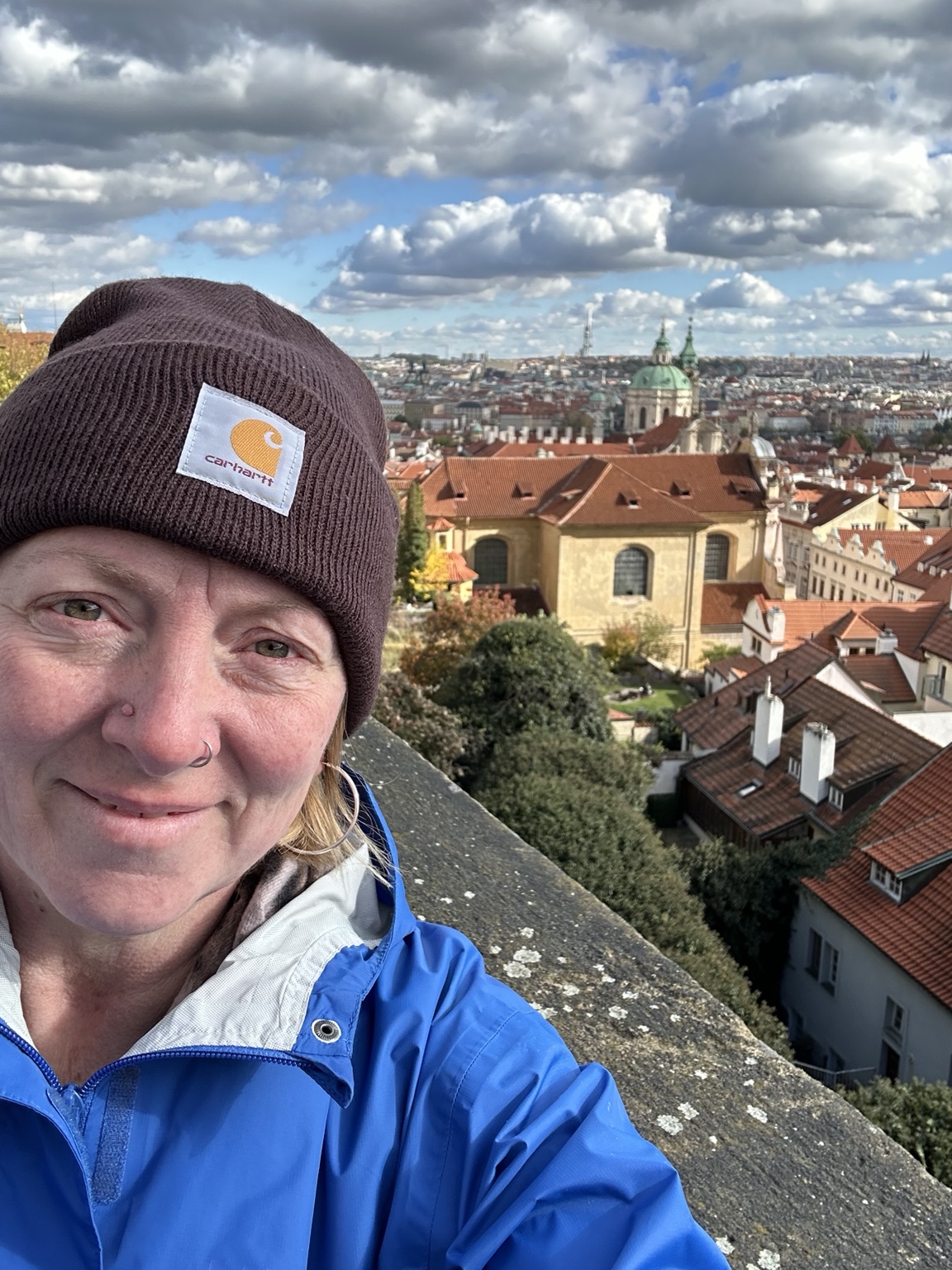 Jamie overlooking Prague's red rooftops