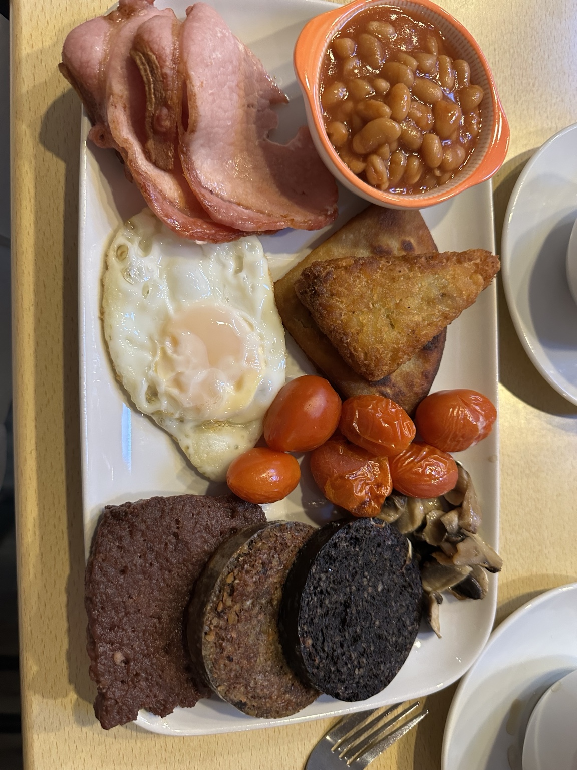A full Scottish breakfast with haggis, black pudding, eggs, bacon and beans