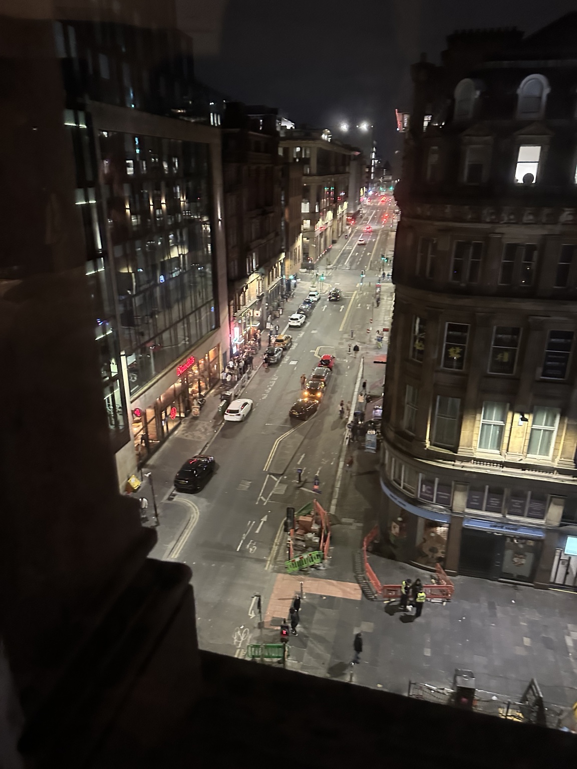 Glasgow streets at night from a hotel window
