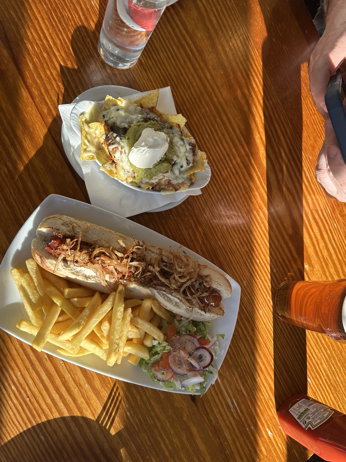 Haggis nachos and a loaded hot dog at The Grog and Gruel