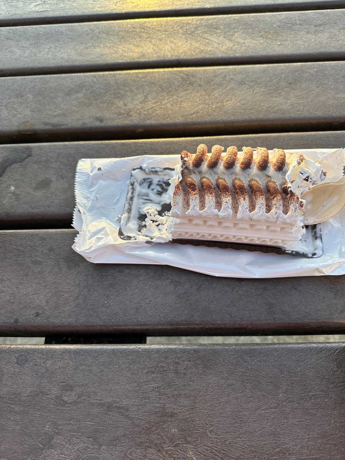 Partially eaten Viennetta on its wrapper